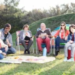Seniors enjoying family camping to stay active and connected